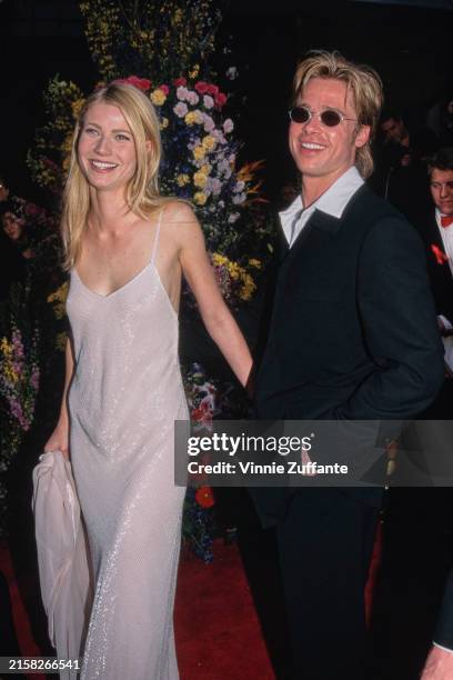 Actor Brad Pitt with his girlfriend, actress Gwyneth Paltrow at the 68th Annual Academy Awards, Los Angeles, California, March 25th 1996.