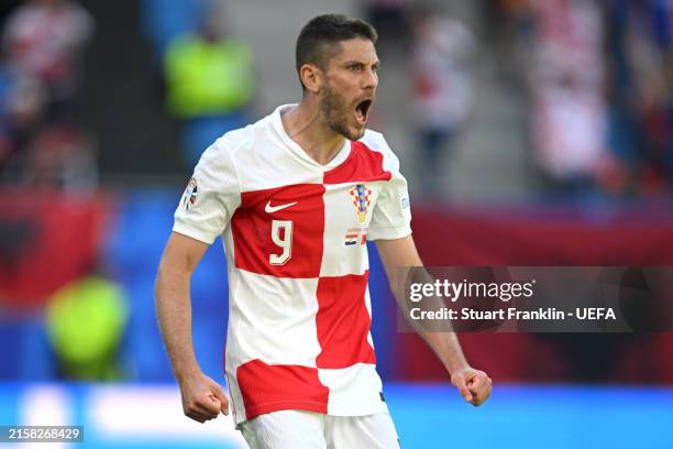 Andrej Kramaric of Croatia celebrates scoring his team's first goal during the UEFA EURO 2024 group stage match between Croatia and Albania at...