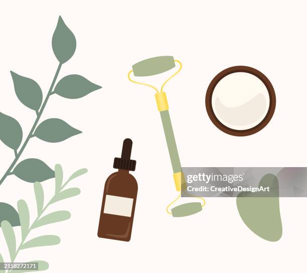 jaderoller und gua sha stein für die gesichtsmassage. hochwinkelansicht von gesichtsserum, feuchtigkeitscreme und blättern. hautpflegeroutine, gesichtsbehandlung und faltenbehandlung - lymphsystem stock-grafiken, -clipart, -cartoons und -symbole