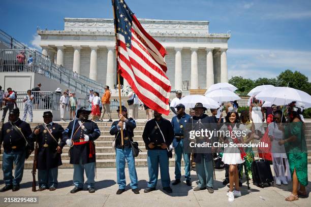 Members of the U.S. Colored Troops and Buffalo Soldiers, an organization of living historians and re-enactors from Maryland, Georgia, Massachusetts...