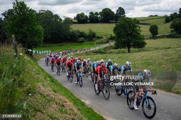 The pack rides during the Men's Elite race of the French National Road Cycling championships, in Saint-Martin-de-Landelles, western France, on June...