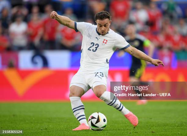 Xherdan Shaqiri of Switzerland scores his team's first goal during the UEFA EURO 2024 group stage match between Scotland and Switzerland at Cologne...