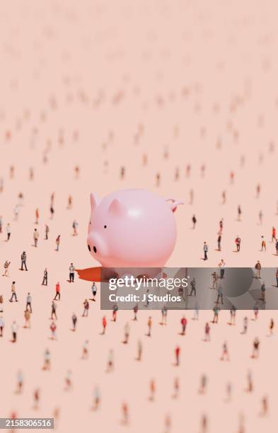 oversized piggybank surrounded by people - crowdfunding stock pictures, royalty-free photos & images