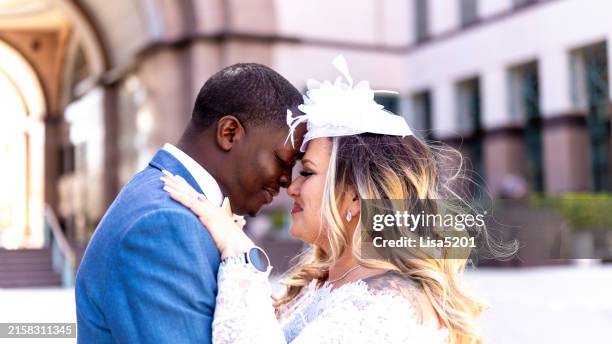bride and groom get married, newlywed portrait of mixed race couple - body positive stock pictures, royalty-free photos & images