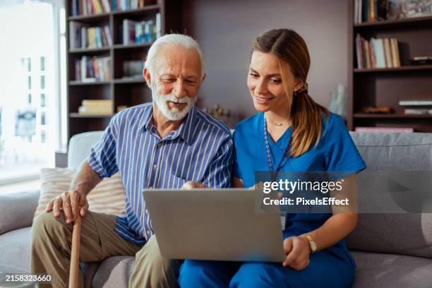 helping seniors live a full life - aged care technology stock pictures, royalty-free photos & images