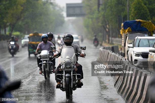 Vehicles moving during drizzling rain at Delhi Noida link road, during afternoon hours, on June 23, 2024 in New Delhi, India.