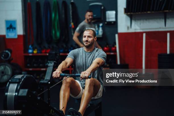 Male Rowing Machine 670 Man Rowing Machine Stock Photos, High-Res Pictures, and Images ...