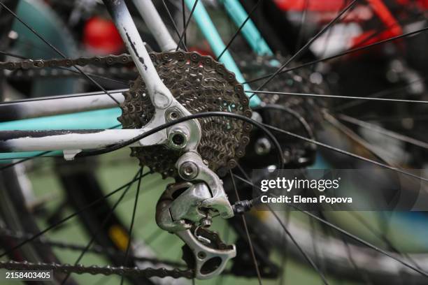 close-up racing bicycle wheel with metal chain - road cycling stock pictures, royalty-free photos & images