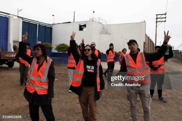 Group of activists gather outside an abattoir in the city to protest animal exploitation on June 23 in Lima, Peru. Animal rights advocates held a...