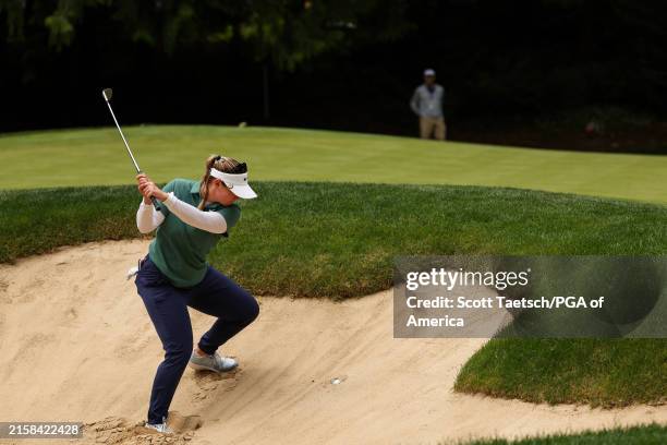 Lang="x-default" SAMMAMISH, WA Caroline Inglis hits out of the bunker on the 15th hole during the final round of the KPMG Women's PGA Championship at...