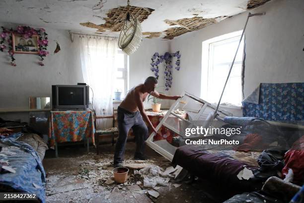Man is removing the debris inside a house after a Russian missile attack in Vasylkiv, Ukraine, on June 23, 2024. On Sunday morning, June 23,...