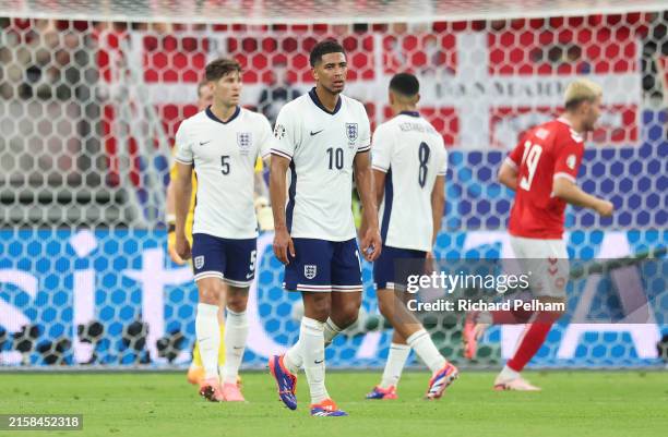 Jude Bellingham of England looks dejected after Morten Hjulmand of Denmark scores his team's first goal during the UEFA EURO 2024 group stage match...