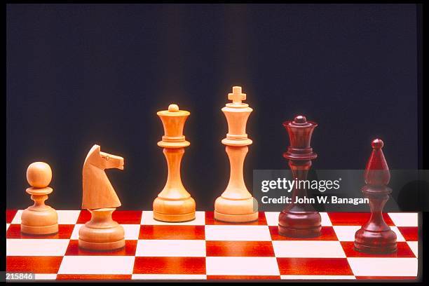 chessmen on board - royal variety stock pictures, royalty-free photos & images