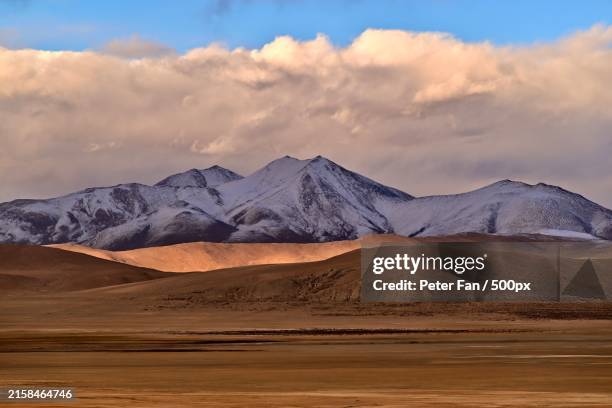 scenic view of snowcapped mountains against sky,ngari,tibet,china - tibet stock pictures, royalty-free photos & images