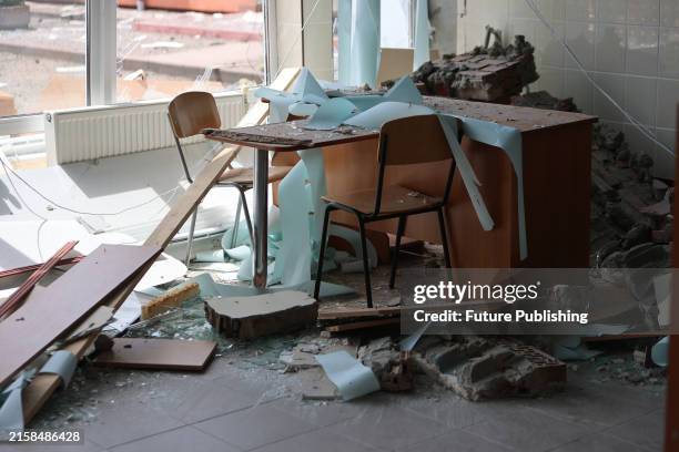 Debris covers a table and chairs at the Ivano-Frankivsk National Technical University of Oil and Gas damaged by a Russian missile attack,...