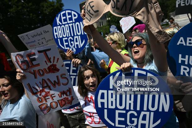 Reproductive rights activists demonstrate in front of the Supreme Court in Washington, DC, on June 24, 2024.