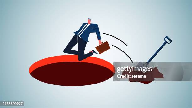 digging a hole, pothole or trap for oneself, a wrong, ignorant or stupid decision, a businessman using a shovel to dig a hole and jumping into it himself - digging hole stock illustrations