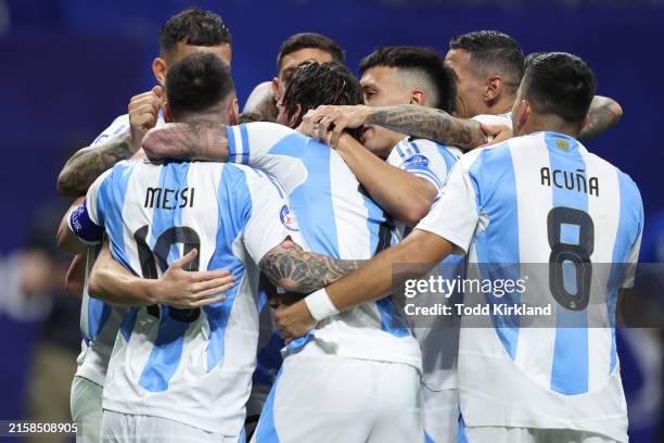 Players of Argentina celebrate after scoring the team's first goal during the CONMEBOL Copa America group A match between Argentina and Canada at...