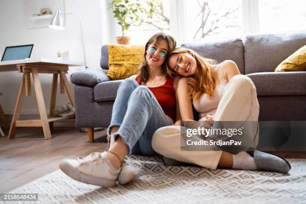 girlfriends at home spending time together - eye patch stock pictures, royalty-free photos & images