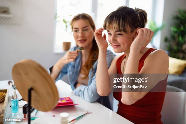 girlfriends doing make-up at home - massage student stock pictures, royalty-free photos & images