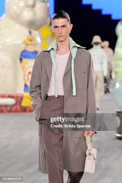 Model walks the runway during the Dior Homme Menswear Spring/Summer 2025 show as part of Paris Fashion Week on June 21, 2024 in Paris, France.