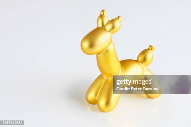 balloon animal on white background - balloon animal stock pictures, royalty-free photos & images