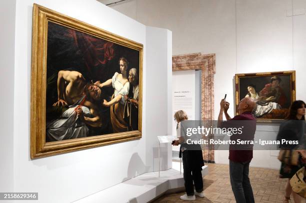 Visitors admires the italian baroque artist Michelangelo Merisi named Caravaggio masterpiece "Judith and Holofernes" part of the permanent collection...