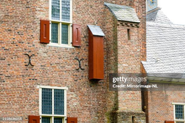 hanging part of a medieval garderobe at doorwerth castle - moat stock pictures, royalty-free photos & images