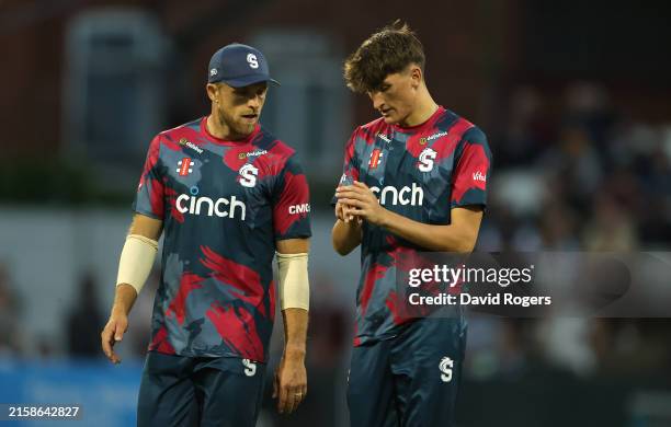 Raphael Weatherall of Northamptonshire Steelbacks receives instructions from tream captain, David Willey before bowling the final over during the T20...