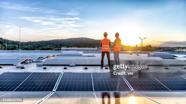 solar panel evaluation by expert engineers - balkans stock pictures, royalty-free photos & images