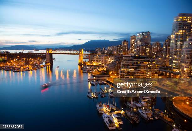 aerial view of vancouver skyline and harbour at night - pacific ocean stock pictures, royalty-free photos & images