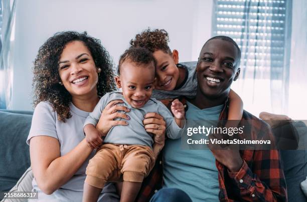 happy family at home. - afroamerikanskt ursprung bildbanksfoton och bilder