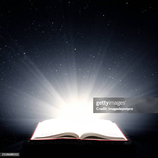 Wisdom and knowledge concept of glowing opened book