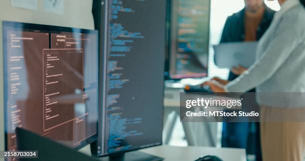 software engineering team engaged in problem-solving and code analysis for web development in modern office. software developer, artificial intelligence and programming. - application programming interface stockfoto's en -beelden