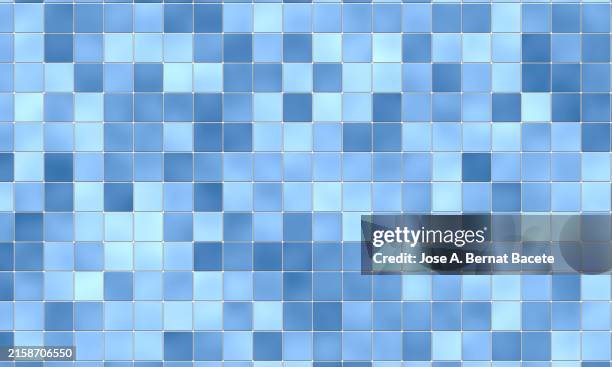 abstract background, wall of square tiles in blue tones. - mosaikstückchen stock-fotos und bilder