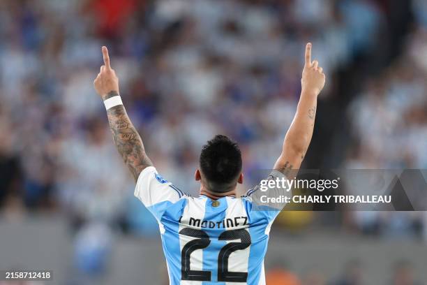 Argentina's forward Lautaro Martinez reacts after scoring a goal during the Conmebol 2024 Copa America tournament group A football match between...