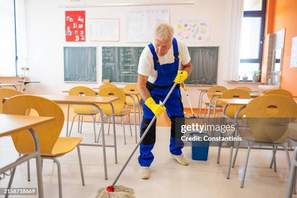 janitors cleaning the school floor in classroom - caretaker stock pictures, royalty-free photos & images