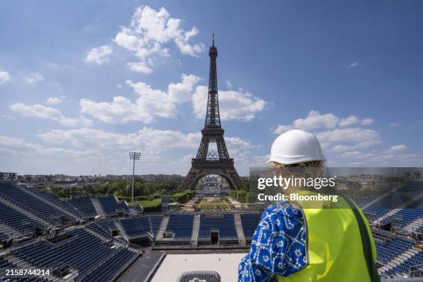 The Eiffel Tower Olympic stadium under construction in Paris, France, on Tuesday, June 25, 2024. France has poured 1.4 billion into cleaning up the...