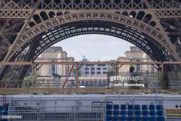 The Eiffel Tower Olympic stadium under construction in Paris, France, on Tuesday, June 25, 2024. France has poured 1.4 billion into cleaning up the...