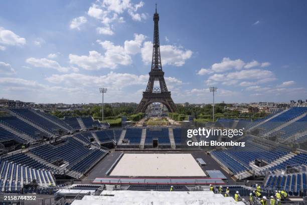 The Eiffel Tower Olympic stadium under construction in Paris, France, on Tuesday, June 25, 2024. France has poured 1.4 billion into cleaning up the...