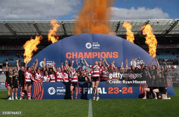 Co-Captains Natasha 'Mo' Hunt and Zoe Aldcroft of Gloucester-Hartpury lift the PWR Allianz Premiership Women's Rugby Final Trophy after her team's...