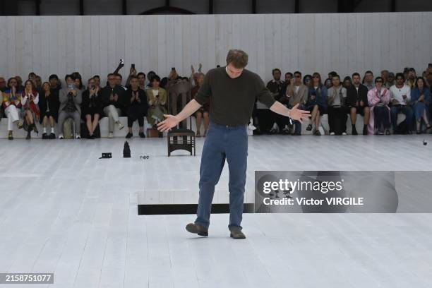 Fashion designer Jonathan Anderson walks the runway during the Loewe Ready to Wear Spring/Summer 2025 fashion show as part of the Paris Men Fashion...
