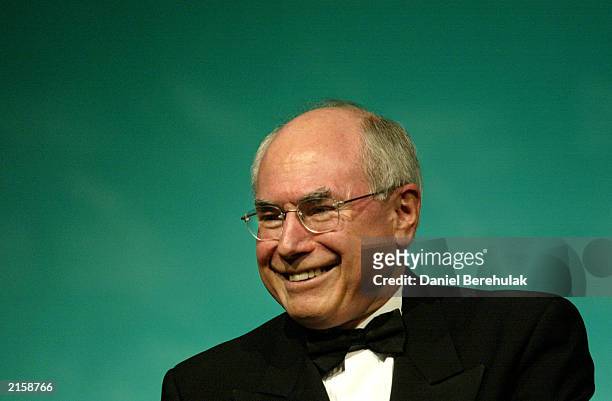 Australian Prime Minister John Howard smiles during the Australian Test Cricketers' Cap Presentation Reunion at the Sydney Convention & Exhibition...