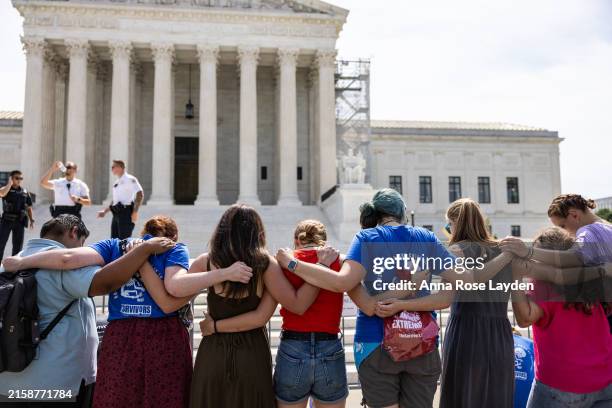 Anti-abortion demonstrators pray in front of the Supreme Court on June 26, 2024 in Washington, DC. A ruling is expected this week in the case of...