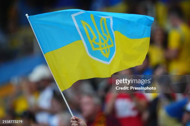 Ukraine flag during the UEFA Euro 2024 match between Ukraine and Belgium, Group E, date 3, played at Mercedes-Benz Arena Stadium on June 26, 2024 in...