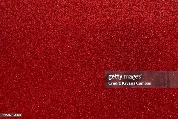red glittering background - paillette-mercerie photos et images de collection
