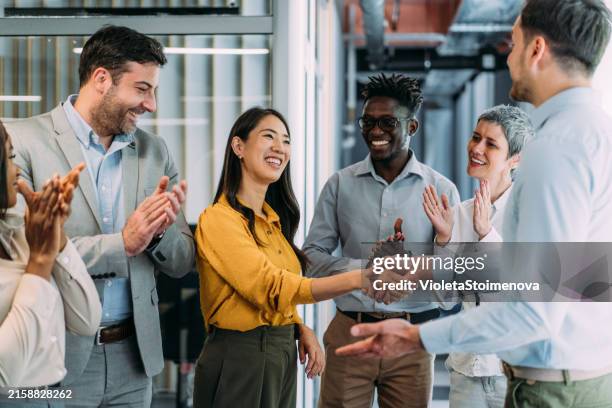 successful partnership - bewunderung stock-fotos und bilder