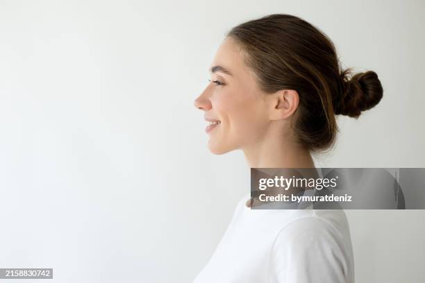profile side photo of young beautiful woman - brunt hår bildbanksfoton och bilder