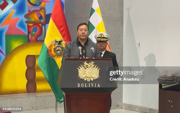 Screen grab captured from a video shows Bolivian President Luis Arce makes a speech as he appointed three new commanders to the military leadership...