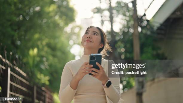 Photo Walk Using Phone 3,600 Smartphone In Hand Walking Stock Photos, High-Res Pictures, and ...